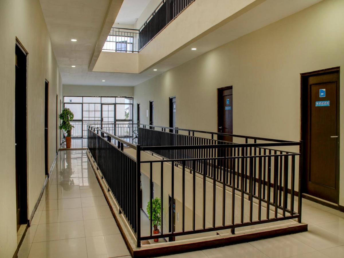 OYO 90162 Remboelan Guest House Sungai Lutus Buitenkant foto