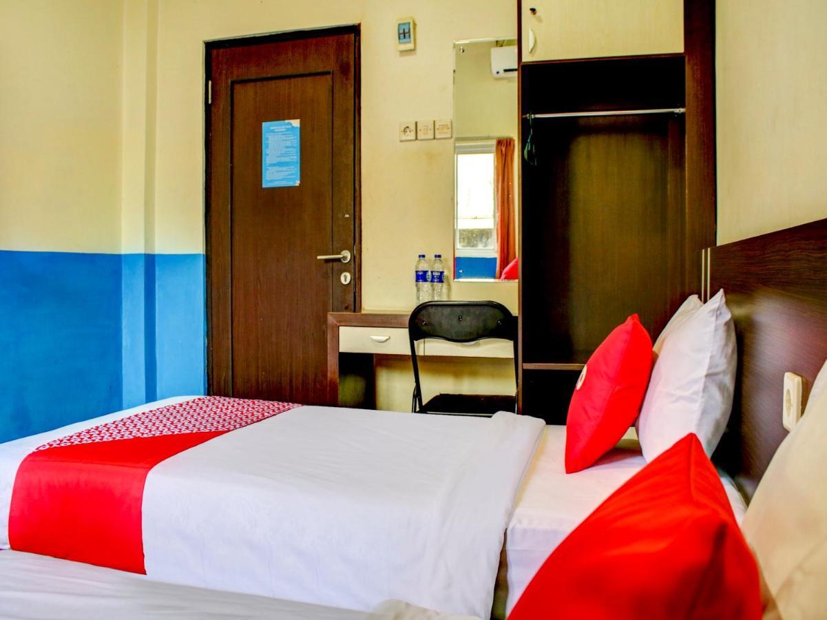 OYO 90162 Remboelan Guest House Sungai Lutus Buitenkant foto