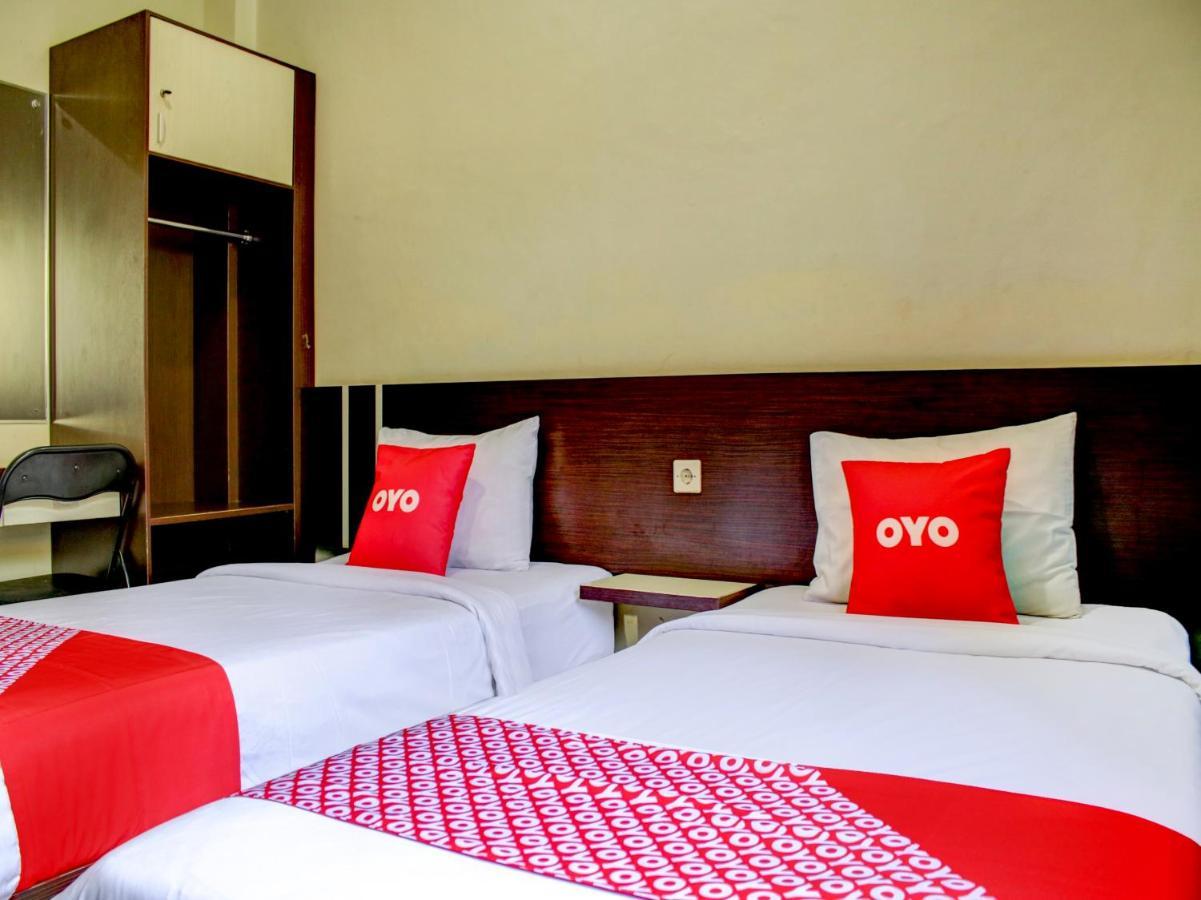 OYO 90162 Remboelan Guest House Sungai Lutus Buitenkant foto