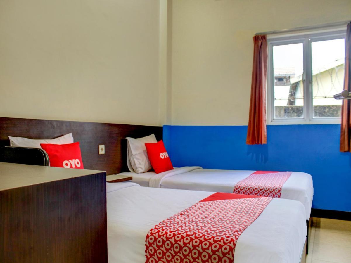 OYO 90162 Remboelan Guest House Sungai Lutus Buitenkant foto