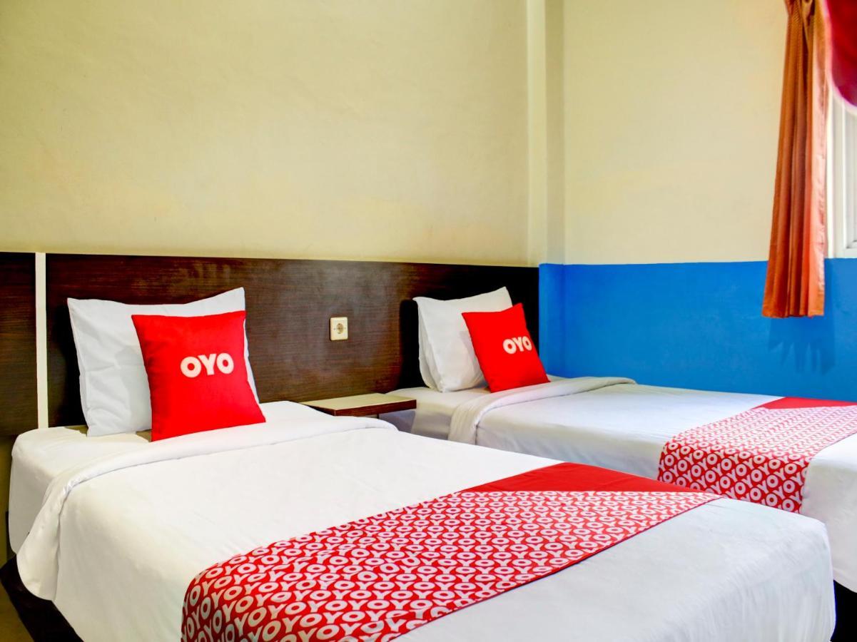 OYO 90162 Remboelan Guest House Sungai Lutus Buitenkant foto