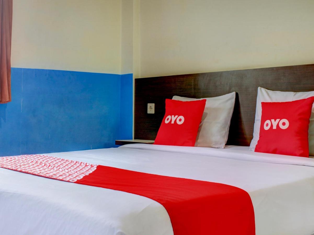OYO 90162 Remboelan Guest House Sungai Lutus Buitenkant foto