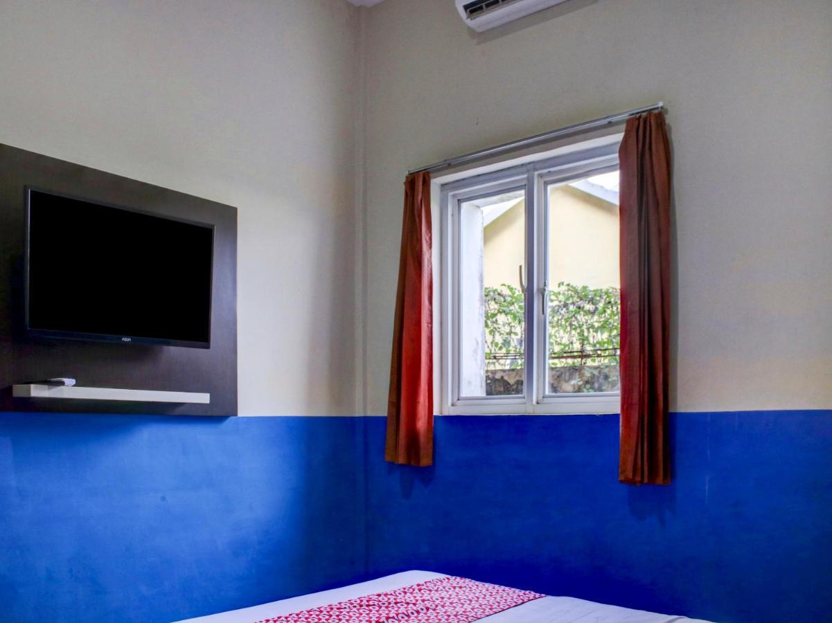 OYO 90162 Remboelan Guest House Sungai Lutus Buitenkant foto