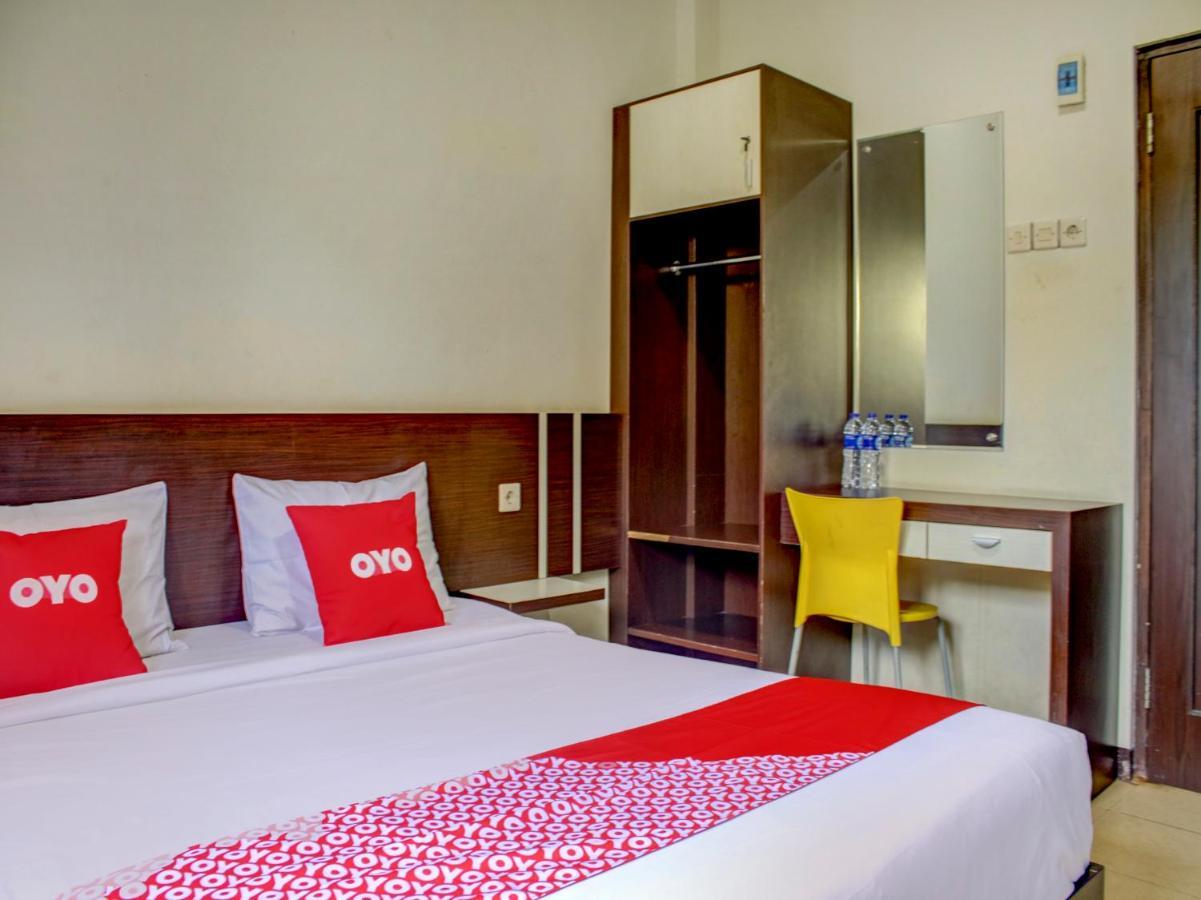 OYO 90162 Remboelan Guest House Sungai Lutus Buitenkant foto