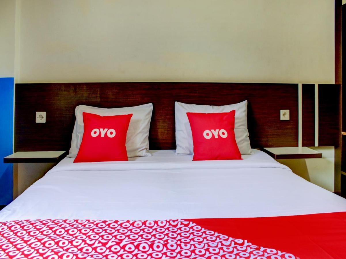 OYO 90162 Remboelan Guest House Sungai Lutus Buitenkant foto